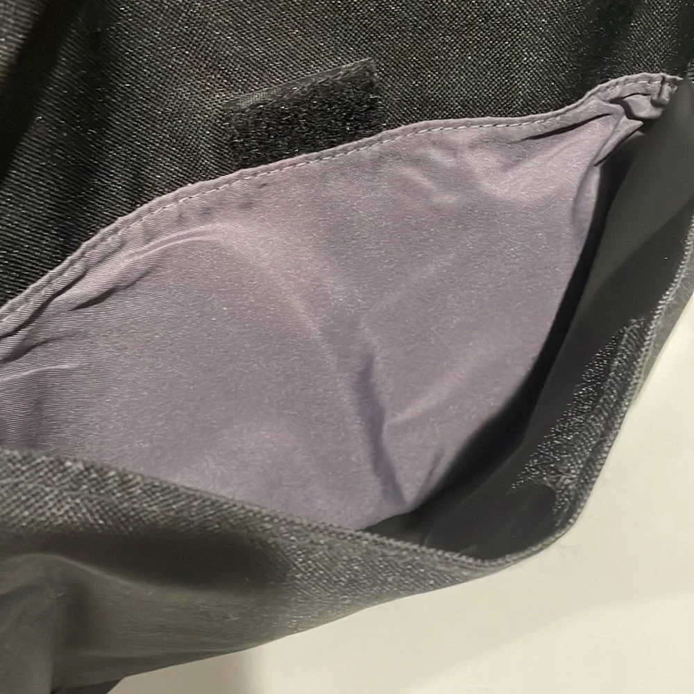 Black and grey canvas messenger bag. NWT